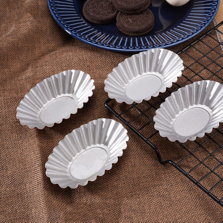 A large oval egg tart mould pu mould chrysanthemum lamp that pie plate mold non-stick pan champagne